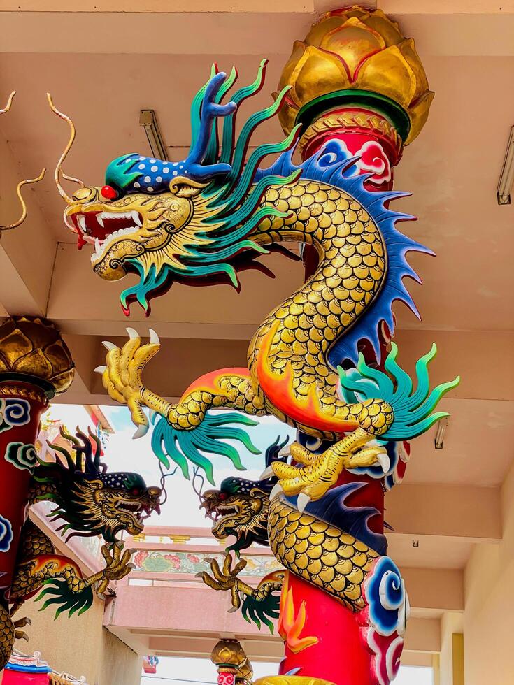 Dragon statue,dragon symbol,dragon Chinese is a beautiful Thai and Chinese architecture of shrine, temple.Symbol of good luck and prosperity during the Chinese New Year celebrations. photo