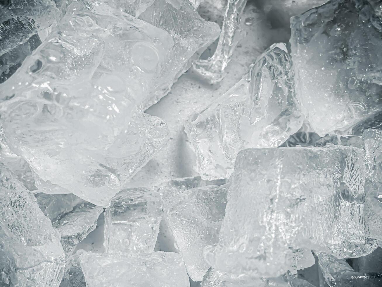 icecubes background,icecubes texture,icecubes wallpaper,ice helps to feel refreshed and cool water from the icecubes helps the water refresh your life and feel good.ice drinks for refreshment business photo