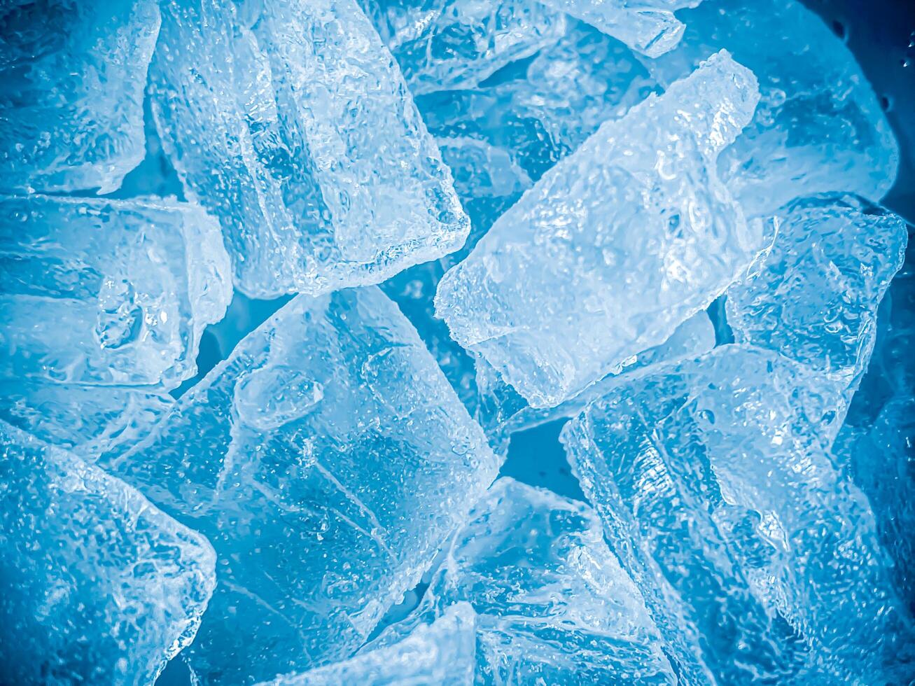 icecubes background,icecubes texture,icecubes wallpaper,ice helps to feel refreshed and cool water from the icecubes helps the water refresh your life and feel good.ice drinks for refreshment business photo