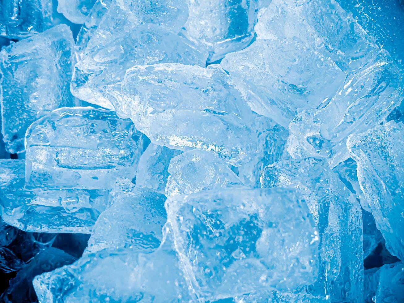 icecubes background,icecubes texture,icecubes wallpaper,ice helps to feel refreshed and cool water from the icecubes helps the water refresh your life and feel good.ice drinks for refreshment business photo