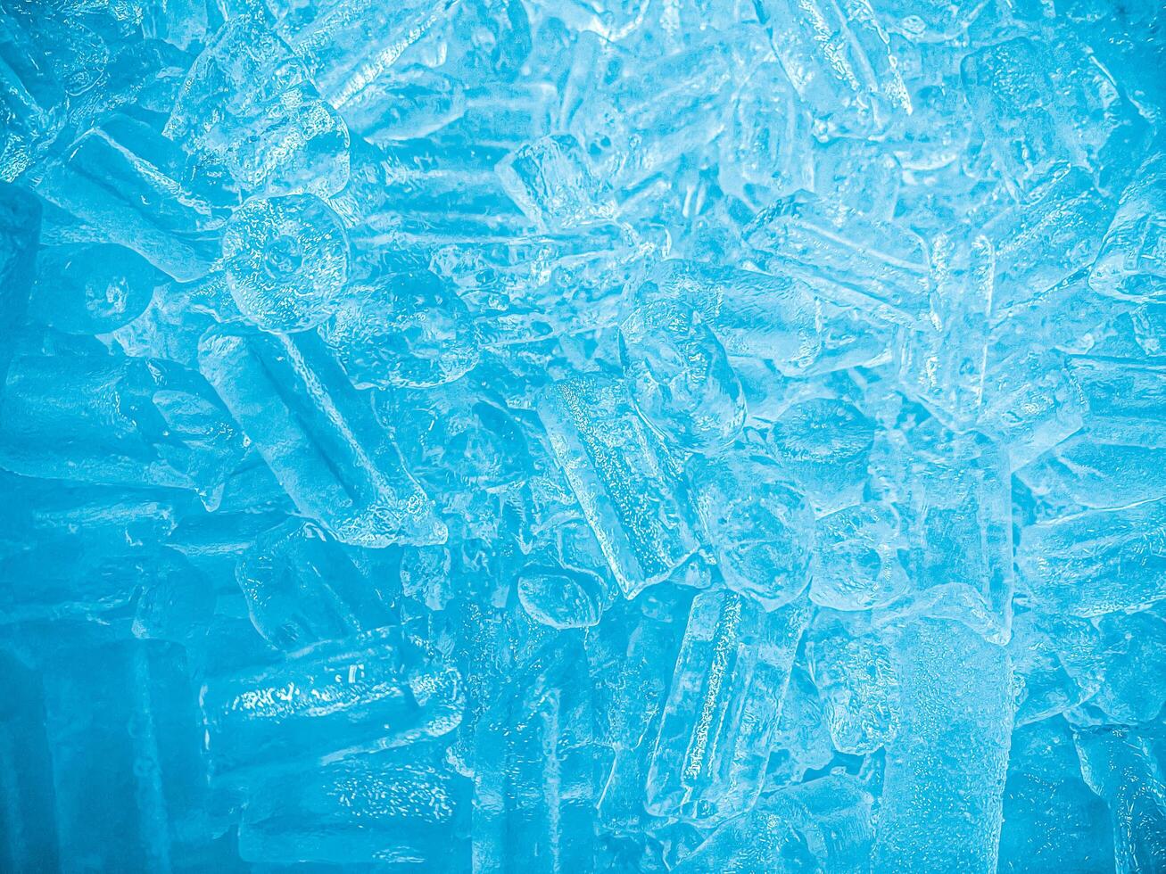 icecubes background,icecubes texture,icecubes wallpaper,ice helps to feel refreshed and cool water from the icecubes helps the water refresh your life and feel good.ice drinks for refreshment business photo