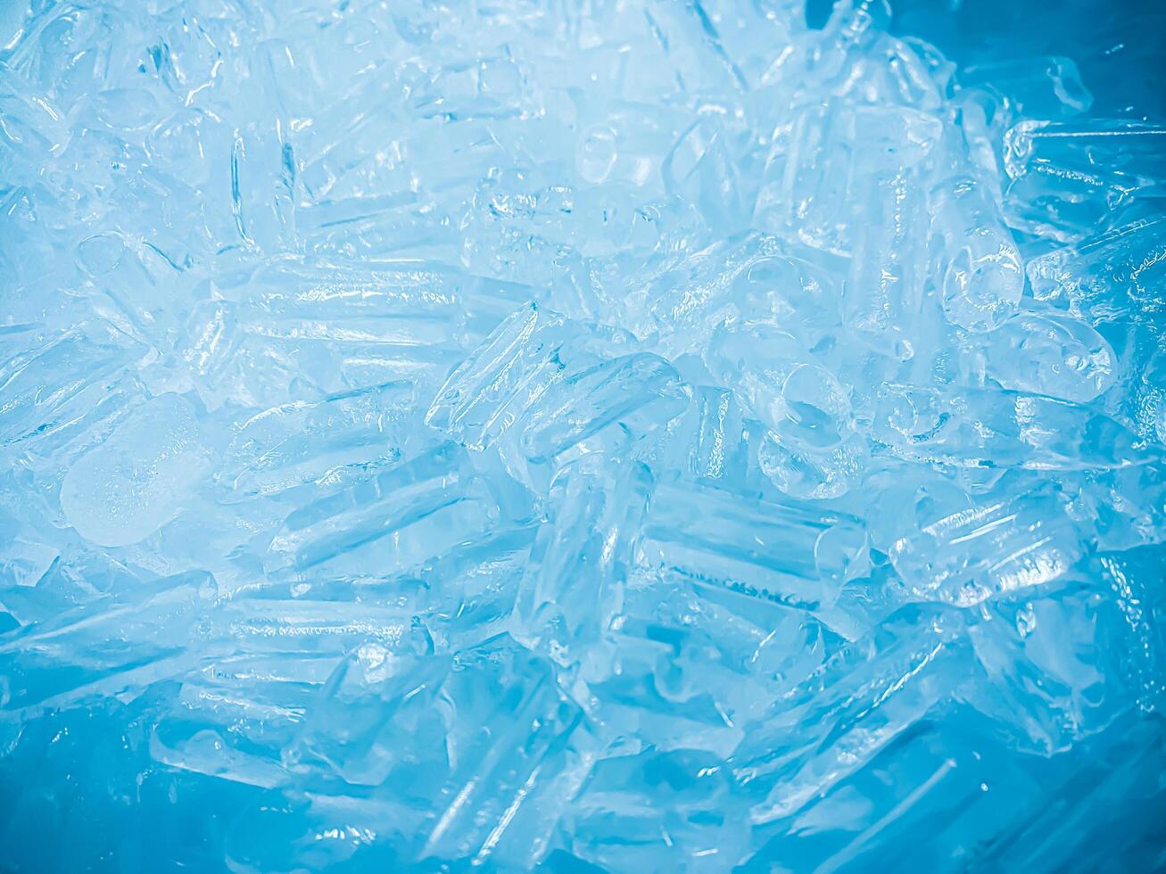 icecubes background,icecubes texture,icecubes wallpaper,ice helps to feel refreshed and cool water from the icecubes helps the water refresh your life and feel good.ice drinks for refreshment business photo