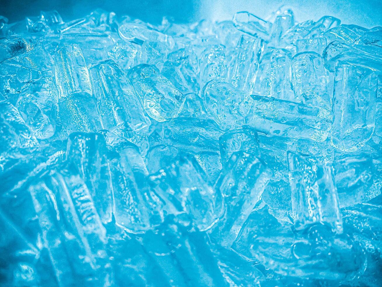 icecubes background,icecubes texture,icecubes wallpaper,ice helps to feel refreshed and cool water from the icecubes helps the water refresh your life and feel good.ice drinks for refreshment business photo