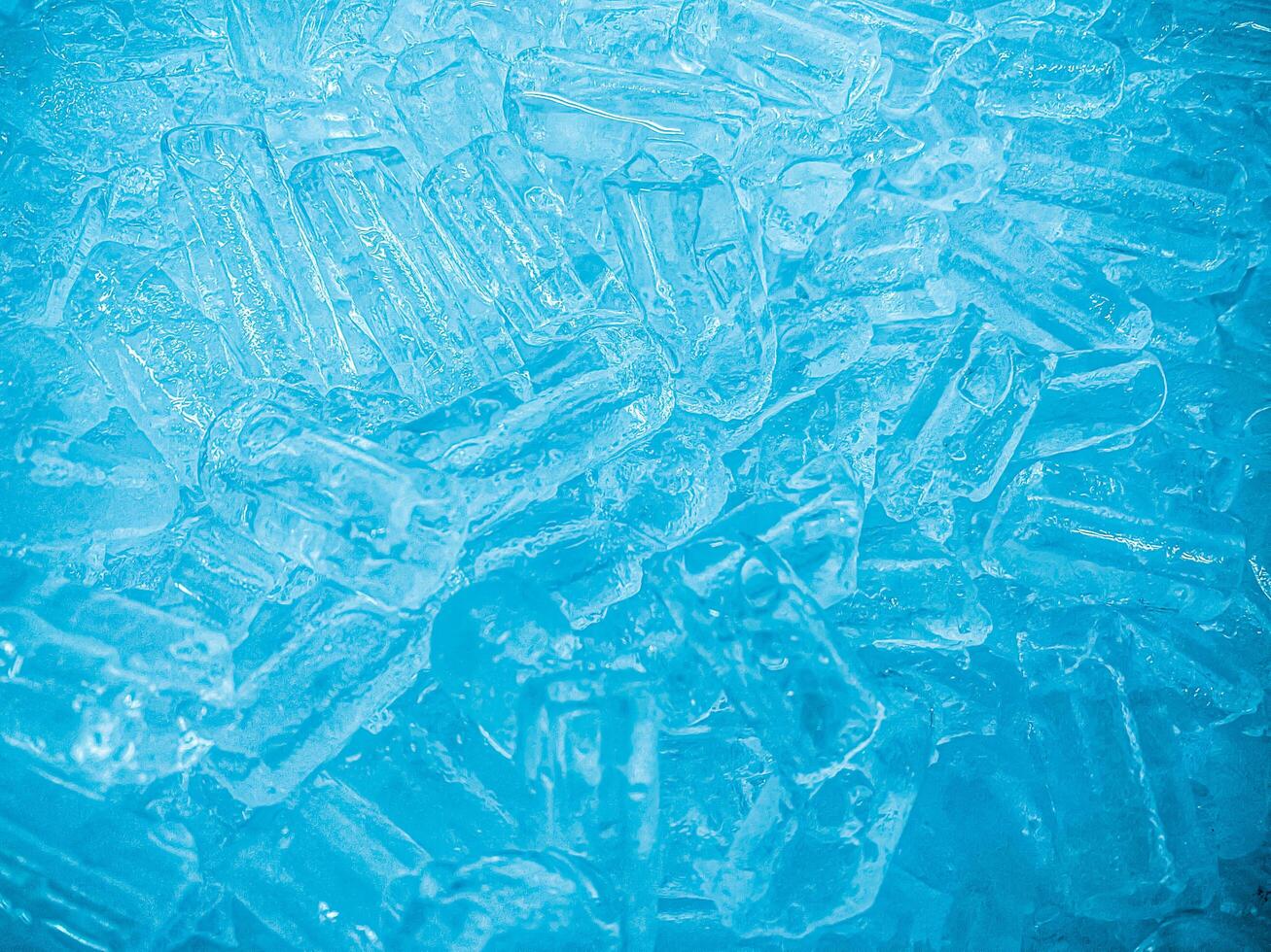 icecubes background,icecubes texture,icecubes wallpaper,ice helps to feel refreshed and cool water from the icecubes helps the water refresh your life and feel good.ice drinks for refreshment business photo