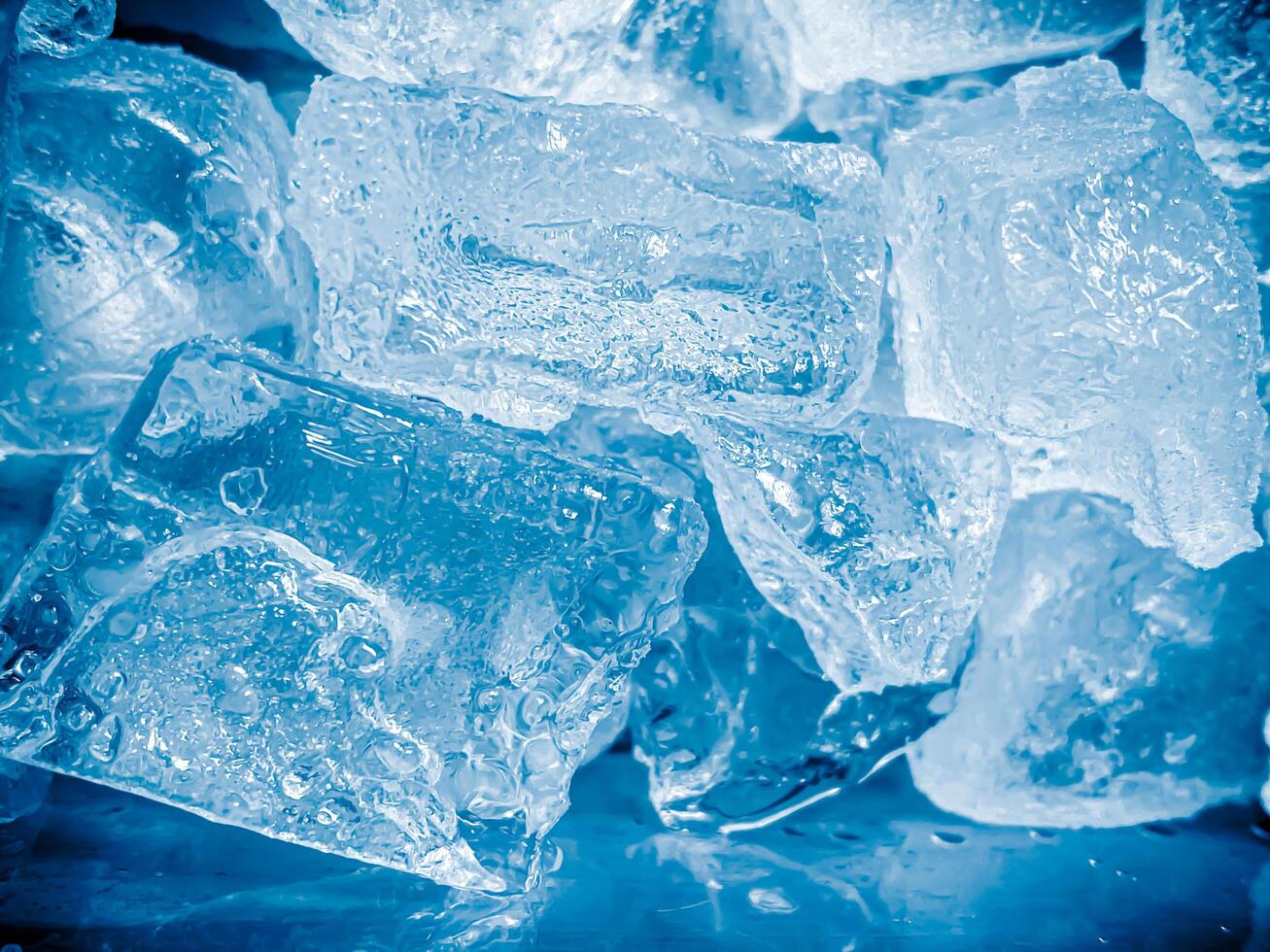 icecubes background,icecubes texture,icecubes wallpaper,ice helps to feel refreshed and cool water from the icecubes helps the water refresh your life and feel good.ice drinks for refreshment business photo