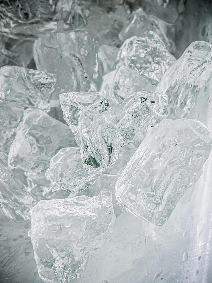 icecubes background,icecubes texture,icecubes wallpaper,ice helps to feel refreshed and cool water from the icecubes helps the water refresh your life and feel good.ice drinks for refreshment business photo