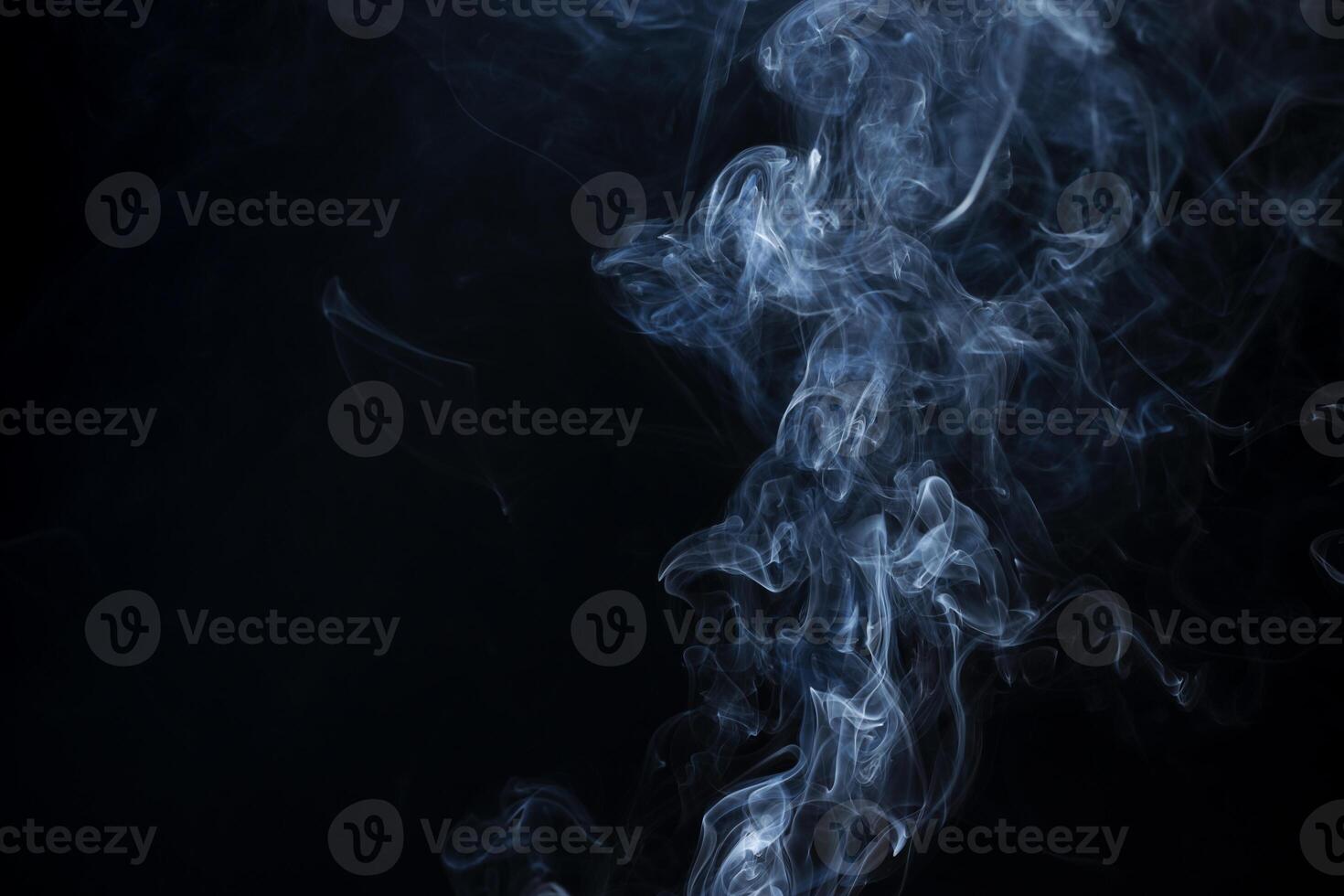 Smoke from flames or fog clouds graphic design art isolated on dark black background. photo