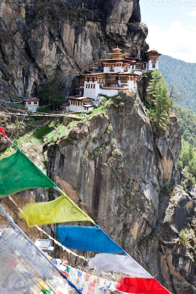 View of Taktsang Palphug Monastery or Tiger's Nest or Paro Taktsang, the buddhist temple on the cliff of a mountain in Paro, Bhutan. photo