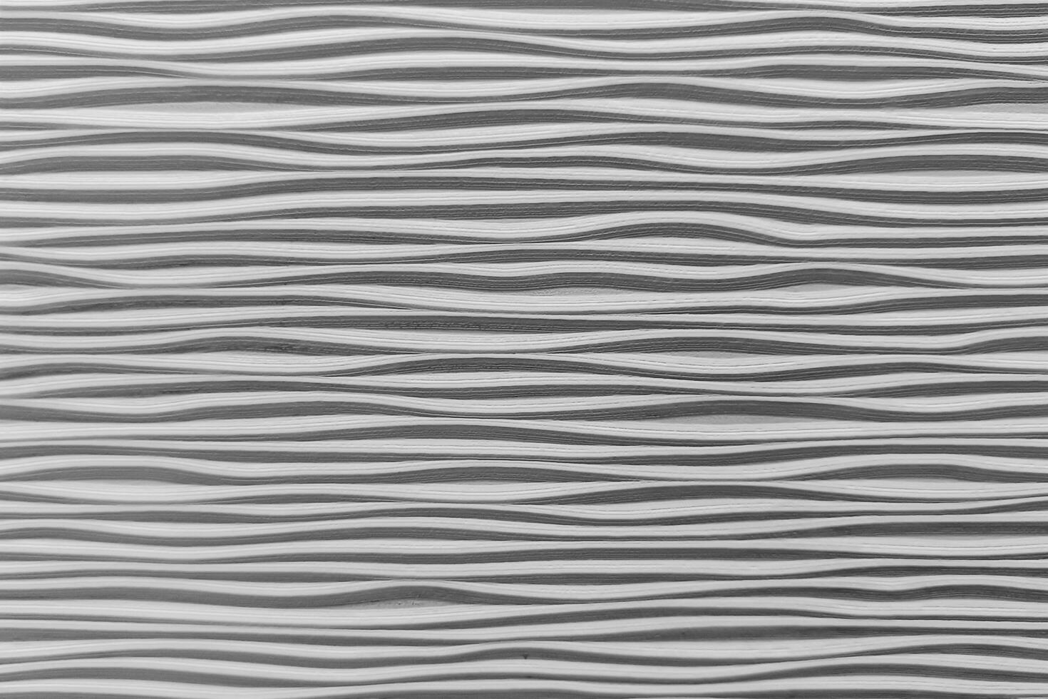 Wave curve pattern on white wall background photo