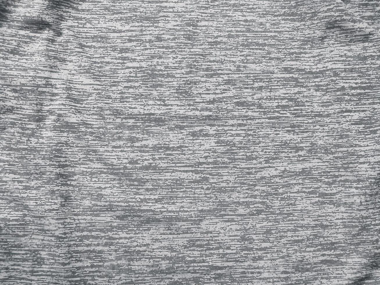 The texture pattern and background of the fabric are gray with lines photo