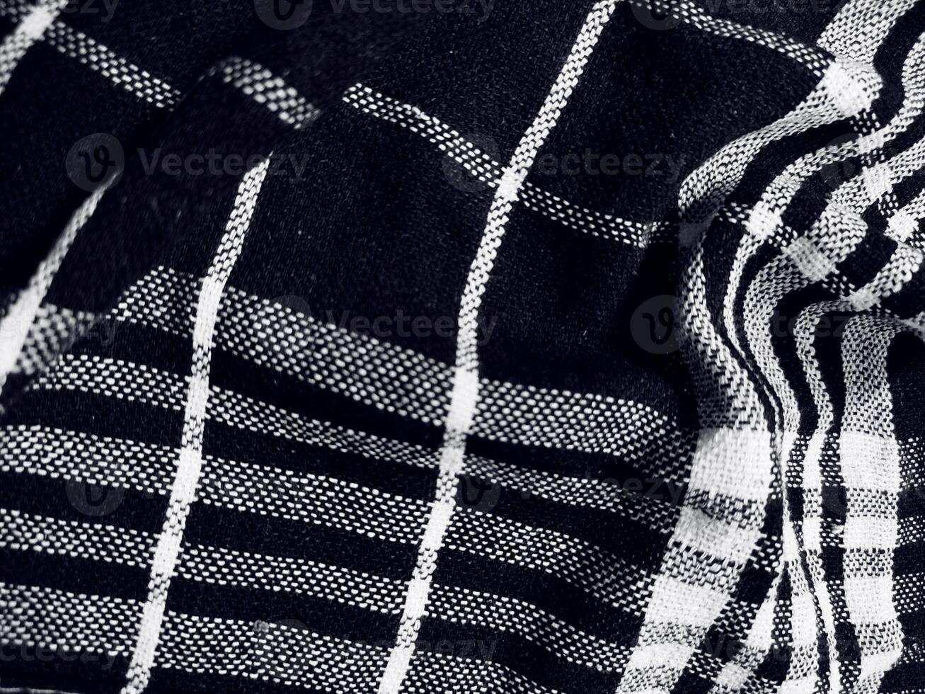 Black fabric background and pattern with white stripes photo
