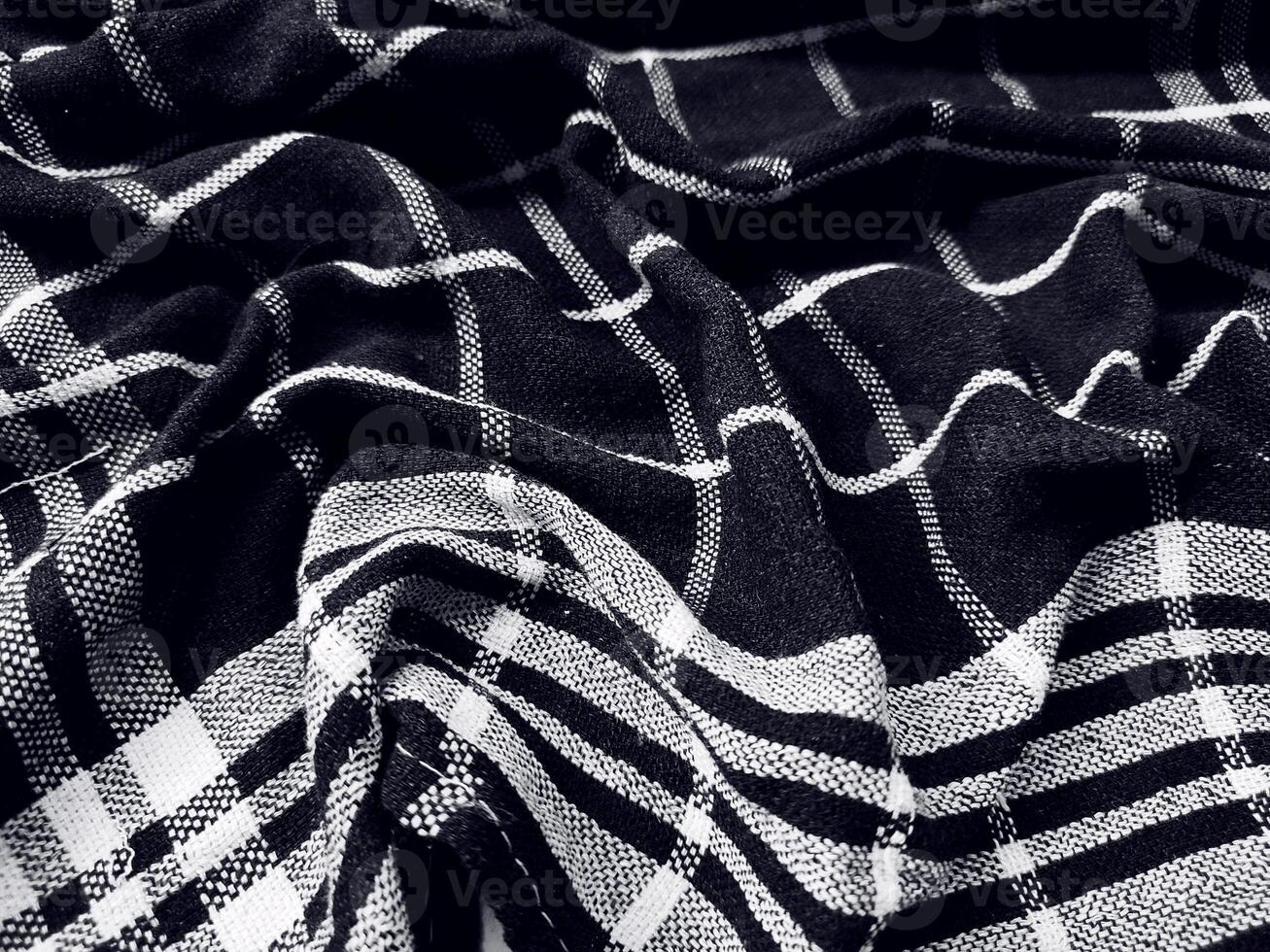 Black fabric background and pattern with white stripes photo