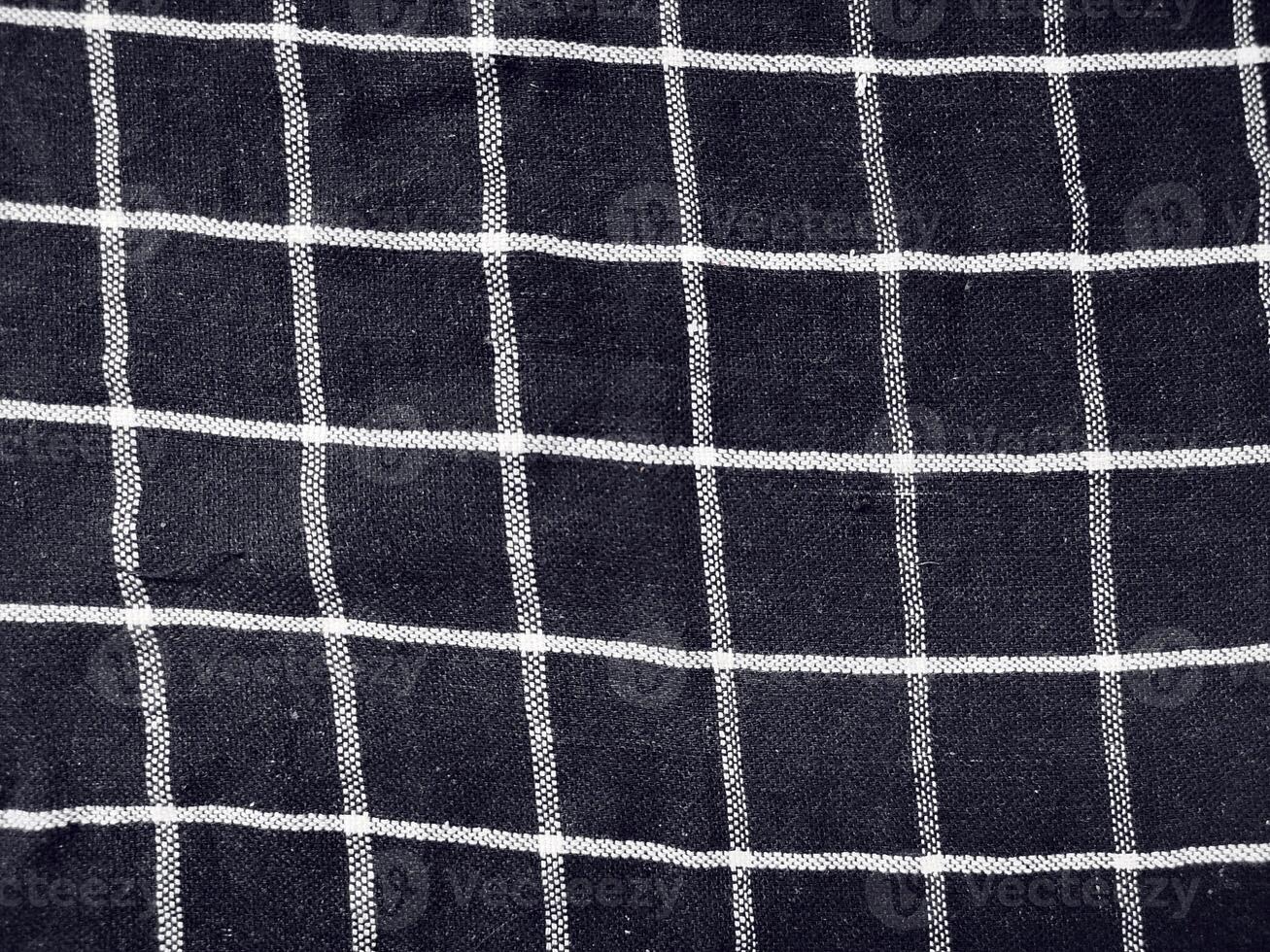 Black fabric background and pattern with white stripes photo