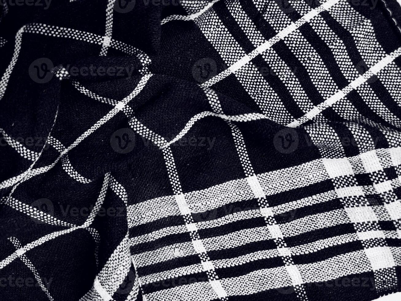 Black fabric background and pattern with white stripes photo