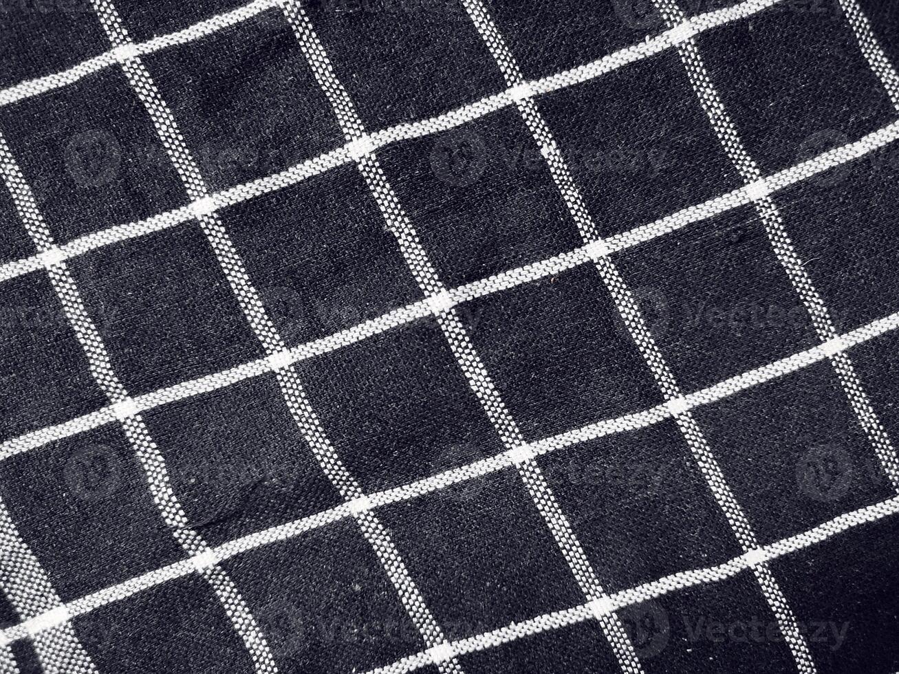 Black fabric background and pattern with white stripes photo