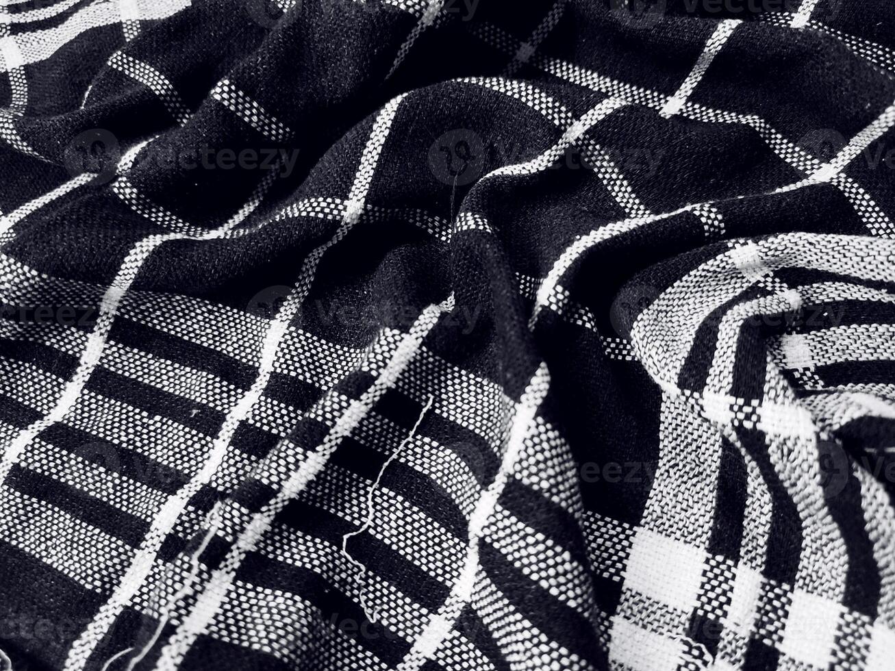 Black fabric background and pattern with white stripes photo
