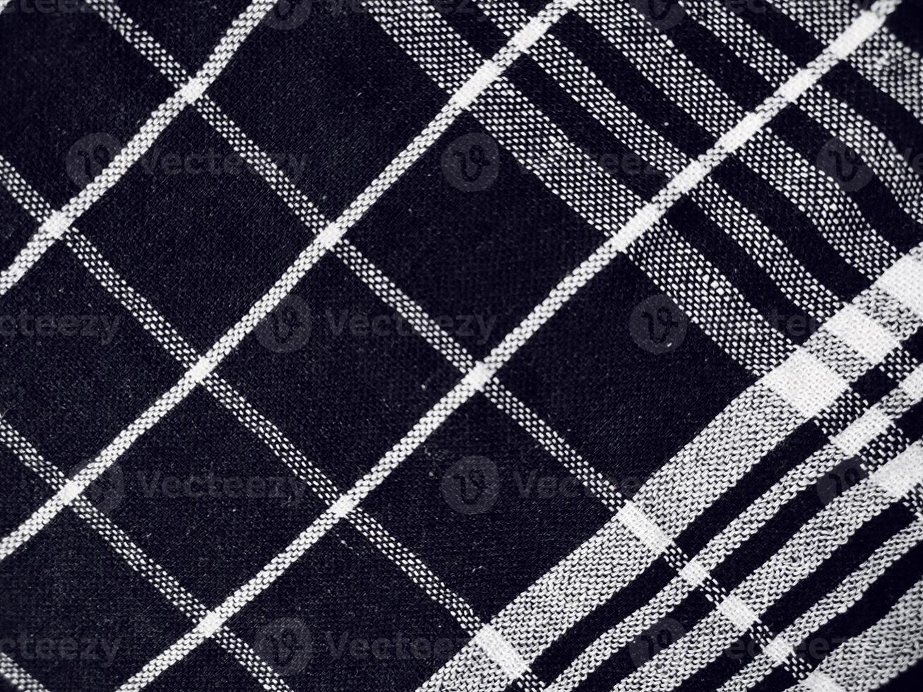 Black fabric background and pattern with white stripes photo