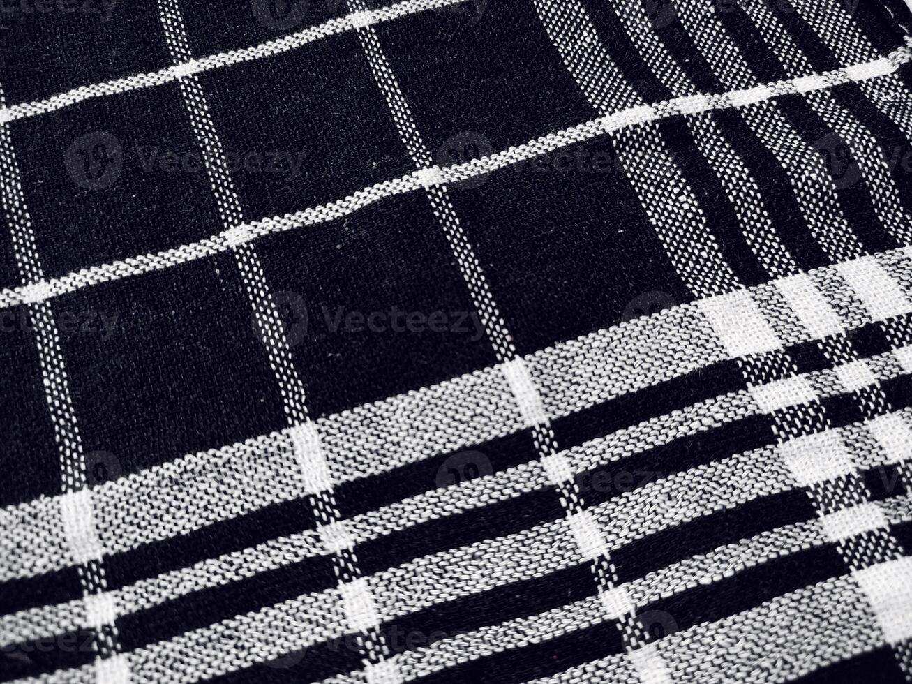 Black fabric background and pattern with white stripes photo