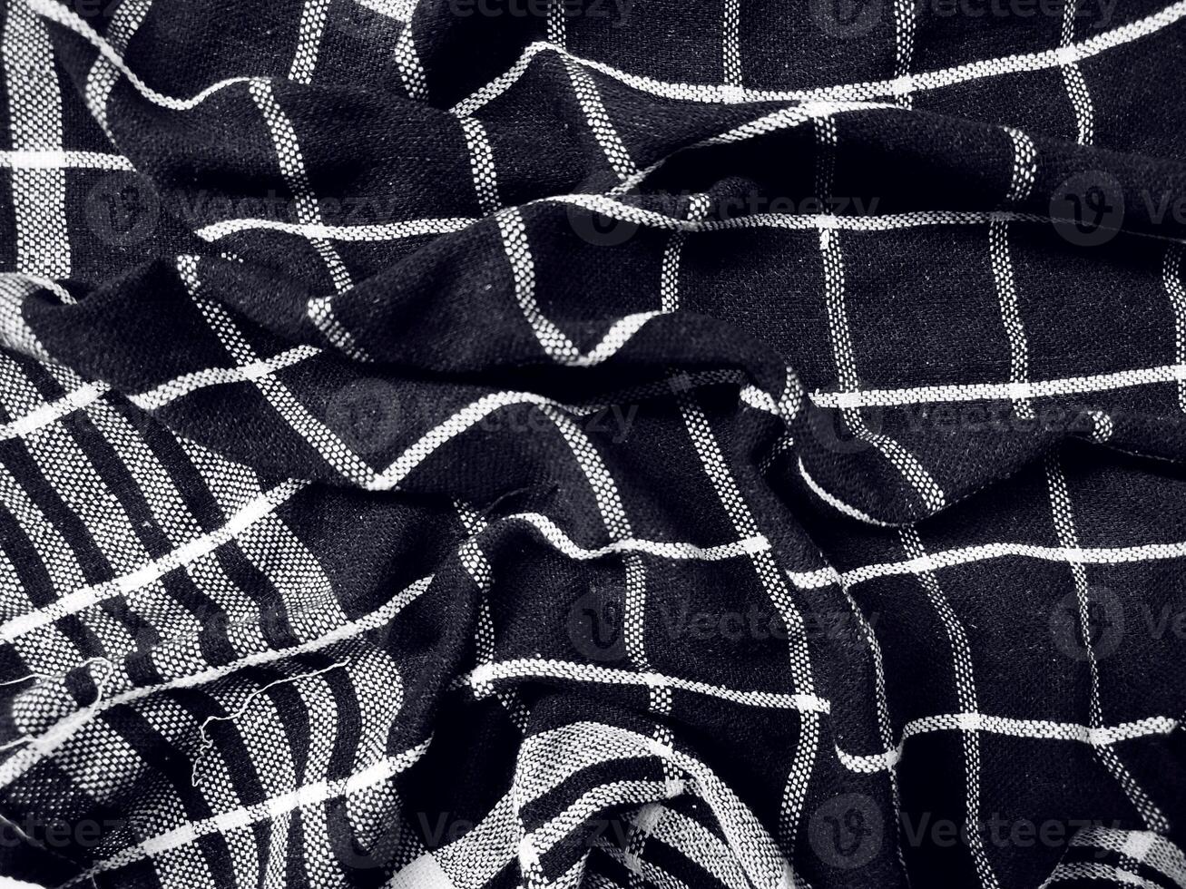 Black fabric background and pattern with white stripes photo