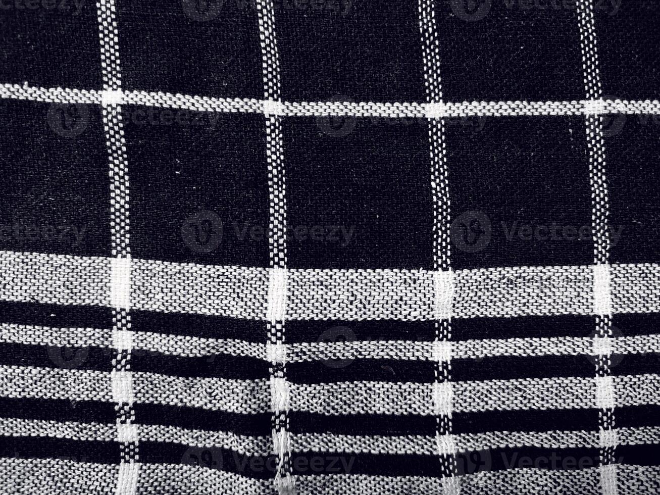 Black fabric background and pattern with white stripes photo
