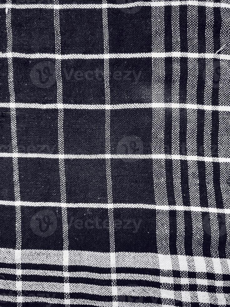 Black fabric background and pattern with white stripes photo