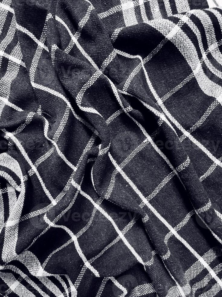 Black fabric background and pattern with white stripes photo