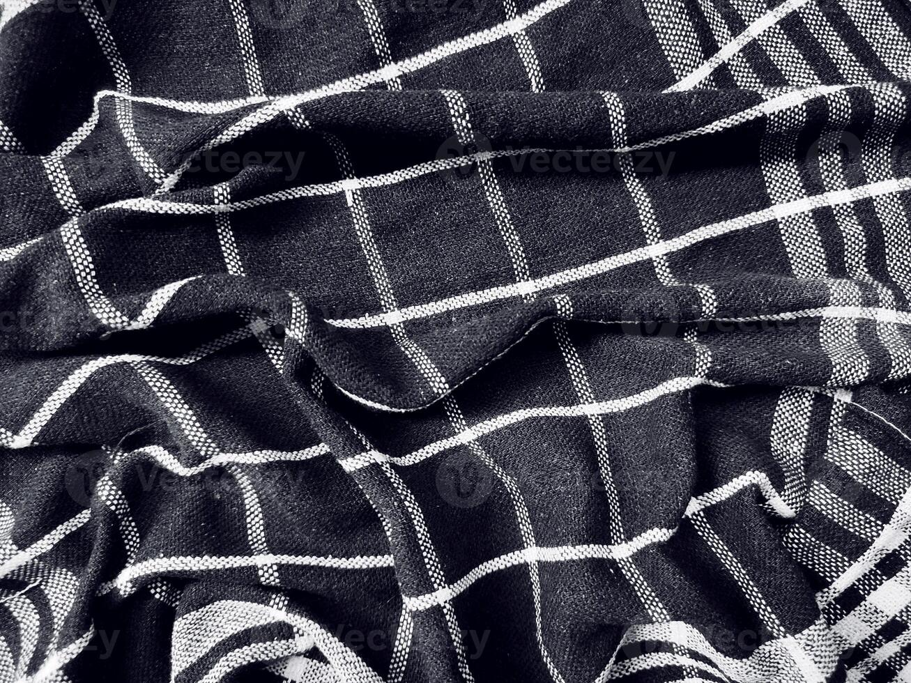 Black fabric background and pattern with white stripes photo