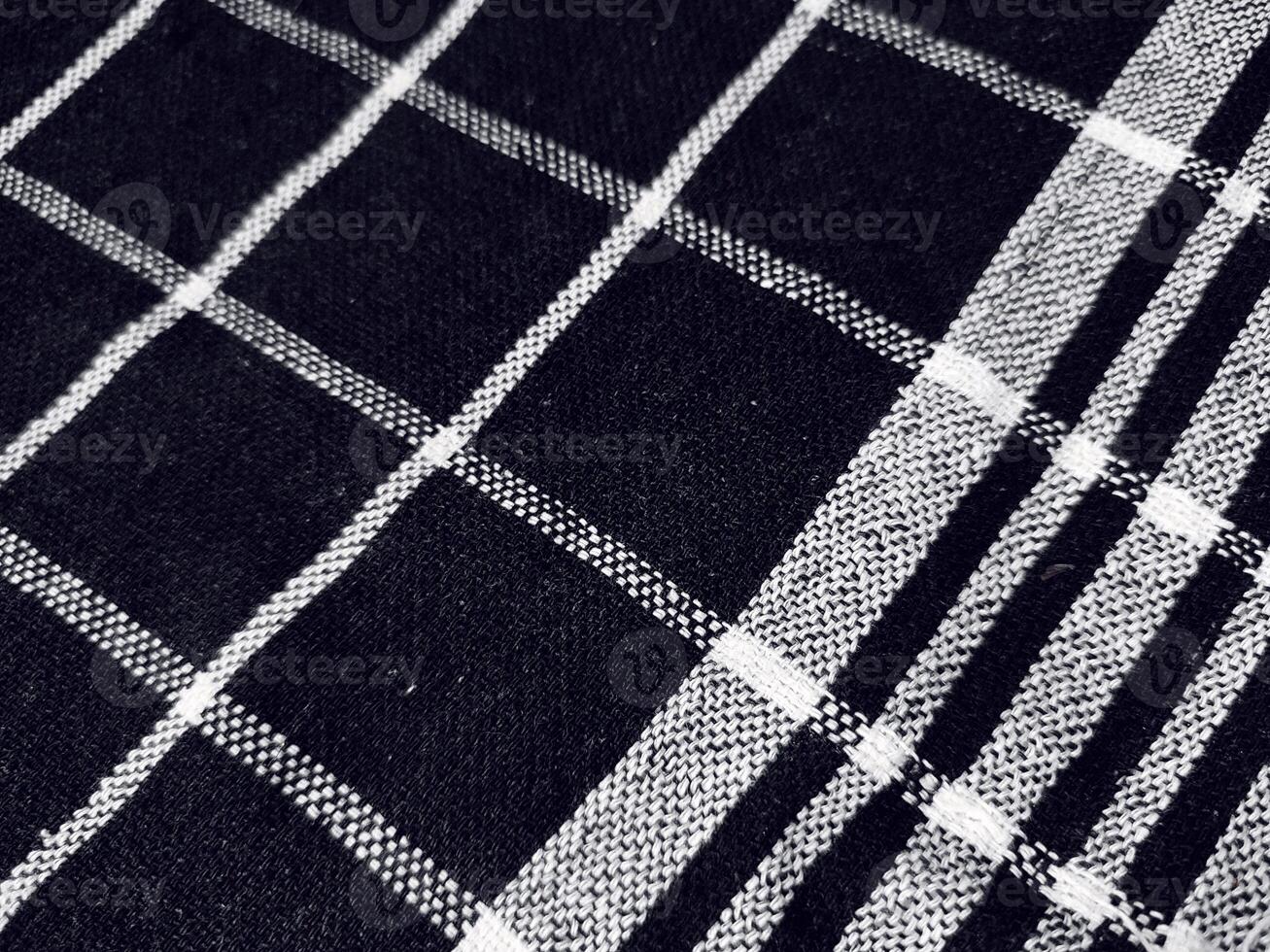 Black fabric background and pattern with white stripes photo