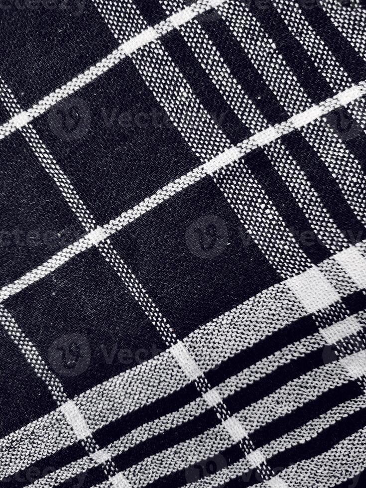 Black fabric background and pattern with white stripes photo