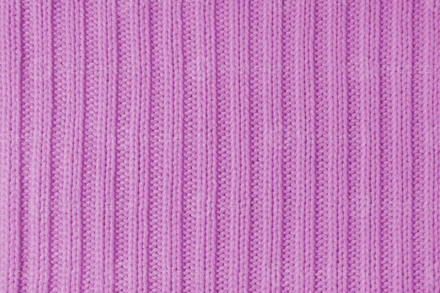 Jersey textile background , pink striped knitted fabric, cloth surface photo