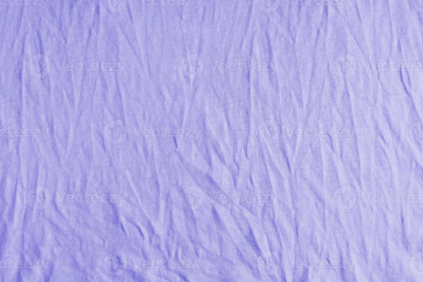Wrinkled, crumpled purple jersey fabric texture background photo