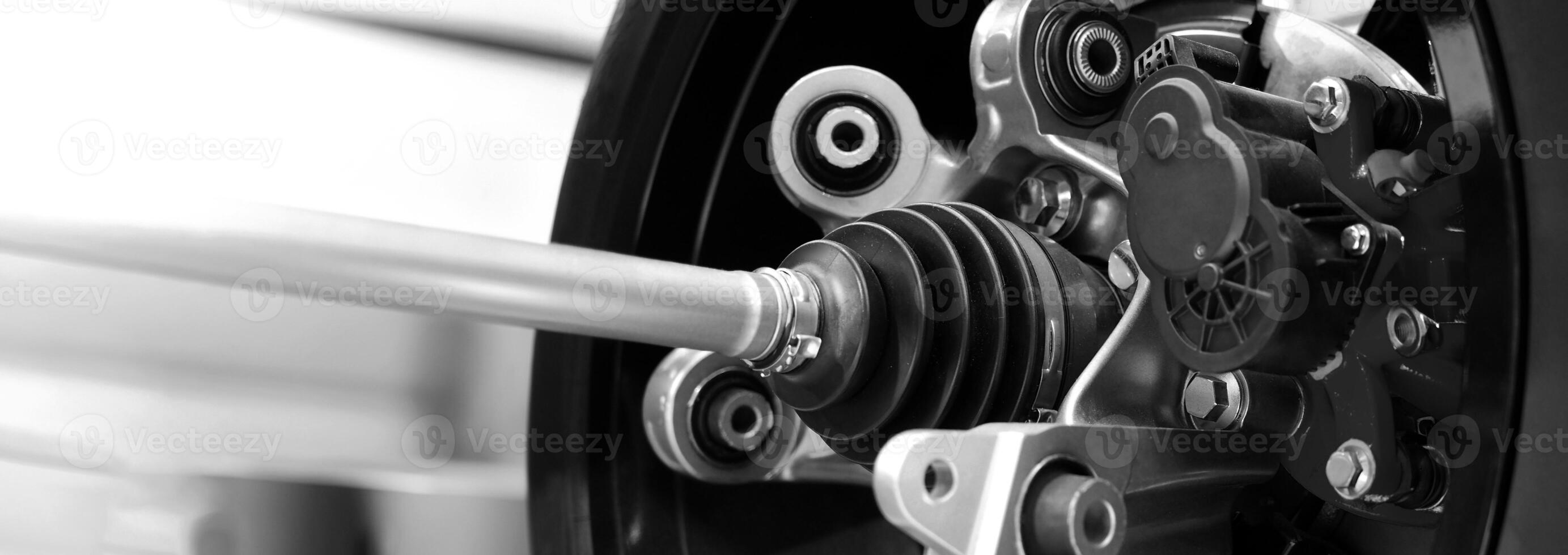 Car suspension and drive shaft. Structure of EV car spare parts. Such as Front or Rear suspension Shock absorber suspension Brake. Elements of the suspension and Chassis structure. Car service repair. photo