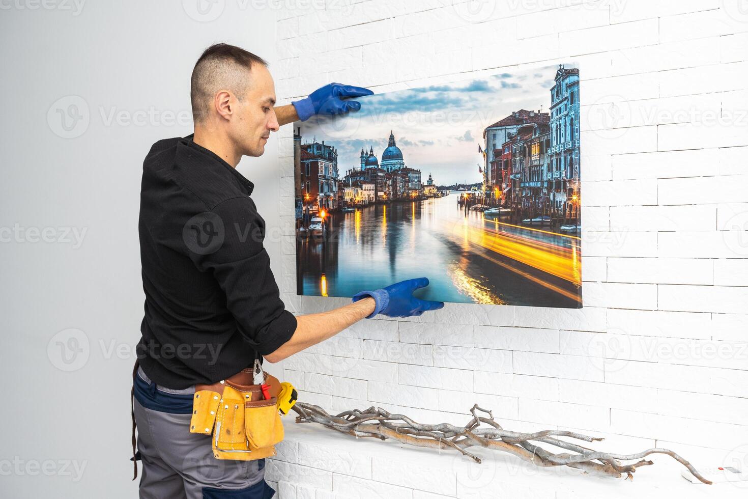 Photo canvas print. A man holding a photography with gallery wrap