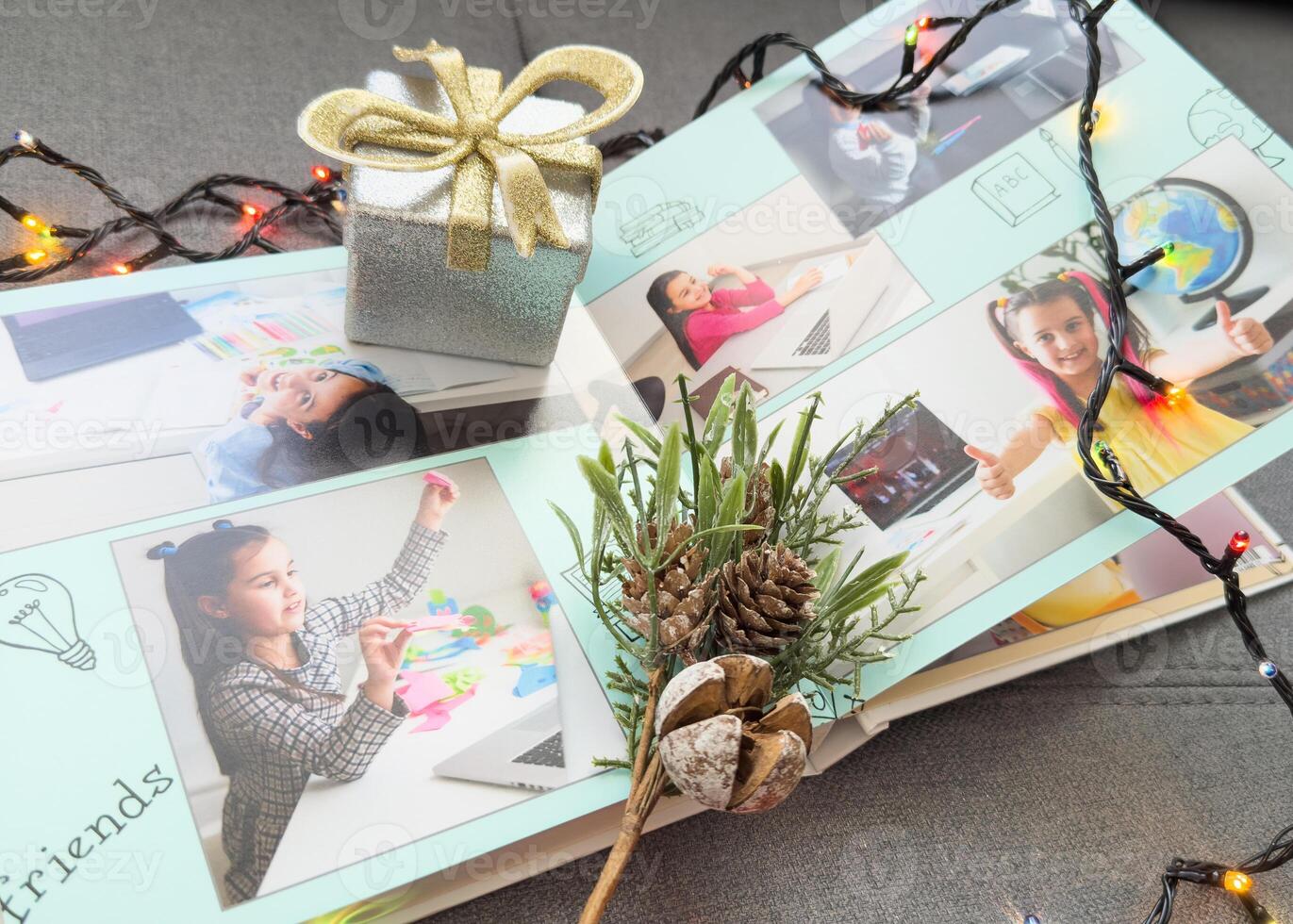 photobooks near the New Year tree, colored as a gift for the holiday. photo