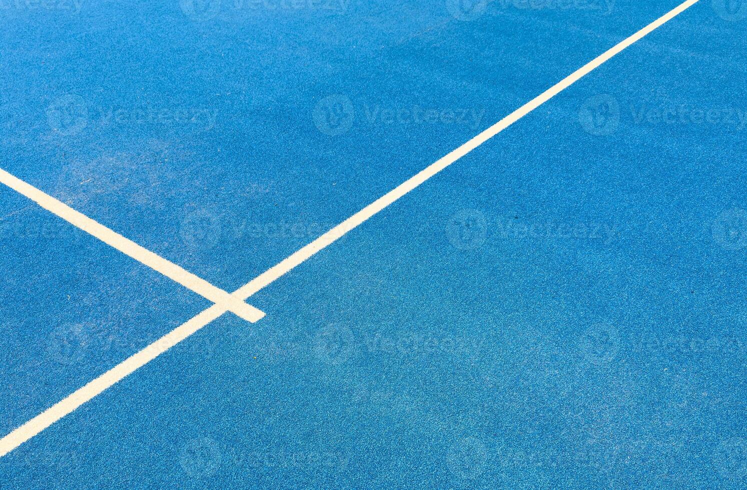 blue paddle tennis court, aerial shot photo