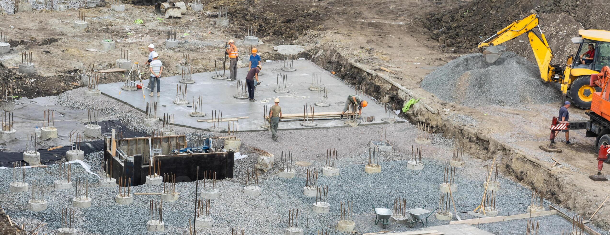 construction site, concrete pouring, piles photo