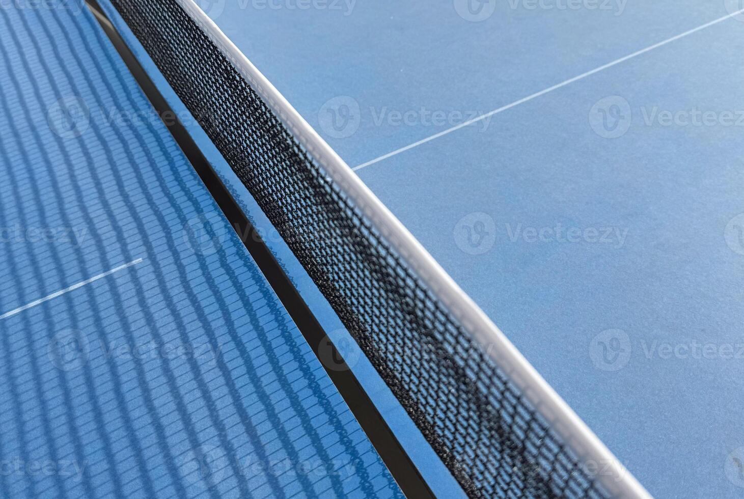ping-pong table with a net photo