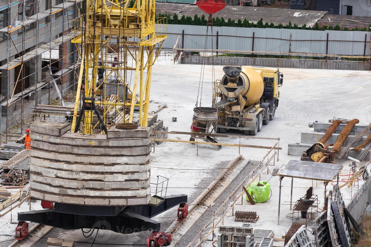 Construction workers working on Construction machine. Aerial platform for workers who work at height on buildings. photo