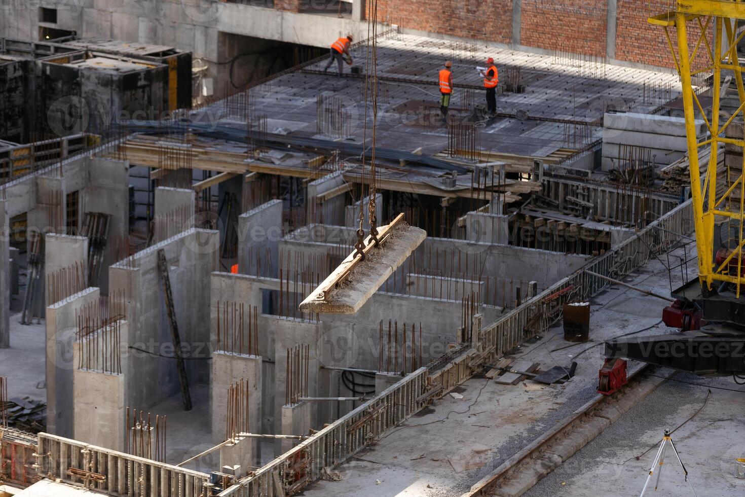 Concrete drainage pipes at the construction site. Laying of underground storm sewer pipes. Installation of water main, sanitary sewer. Installation of concrete sewer wells in the ground photo