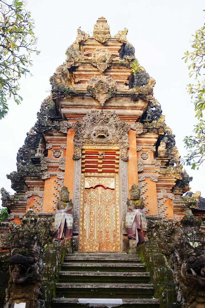 Ancient Pagoda of Portal von Taman Saraswati temple in Ubud city landmark on Bali Island of Indonesia. Travel destination for culture of Asian photo