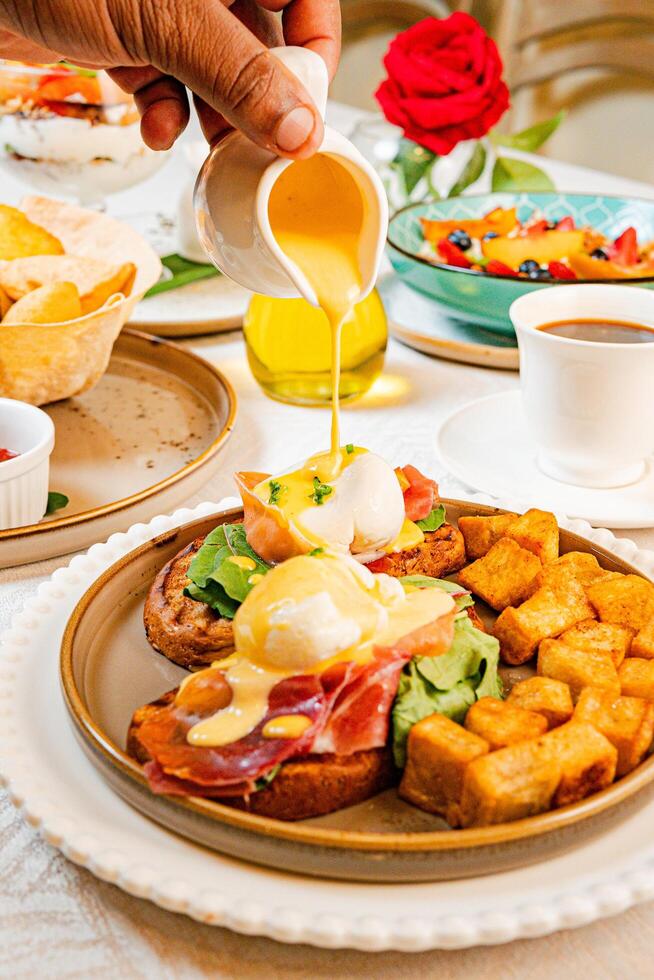 Gourmet breakfast with pieces of pork cracklings, toast, burrata, and serrano ham photo