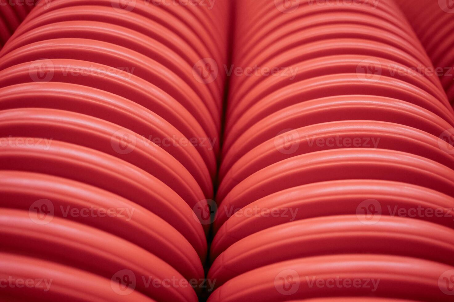 abstract background with striped tube corrugated orange red white. High quality photo