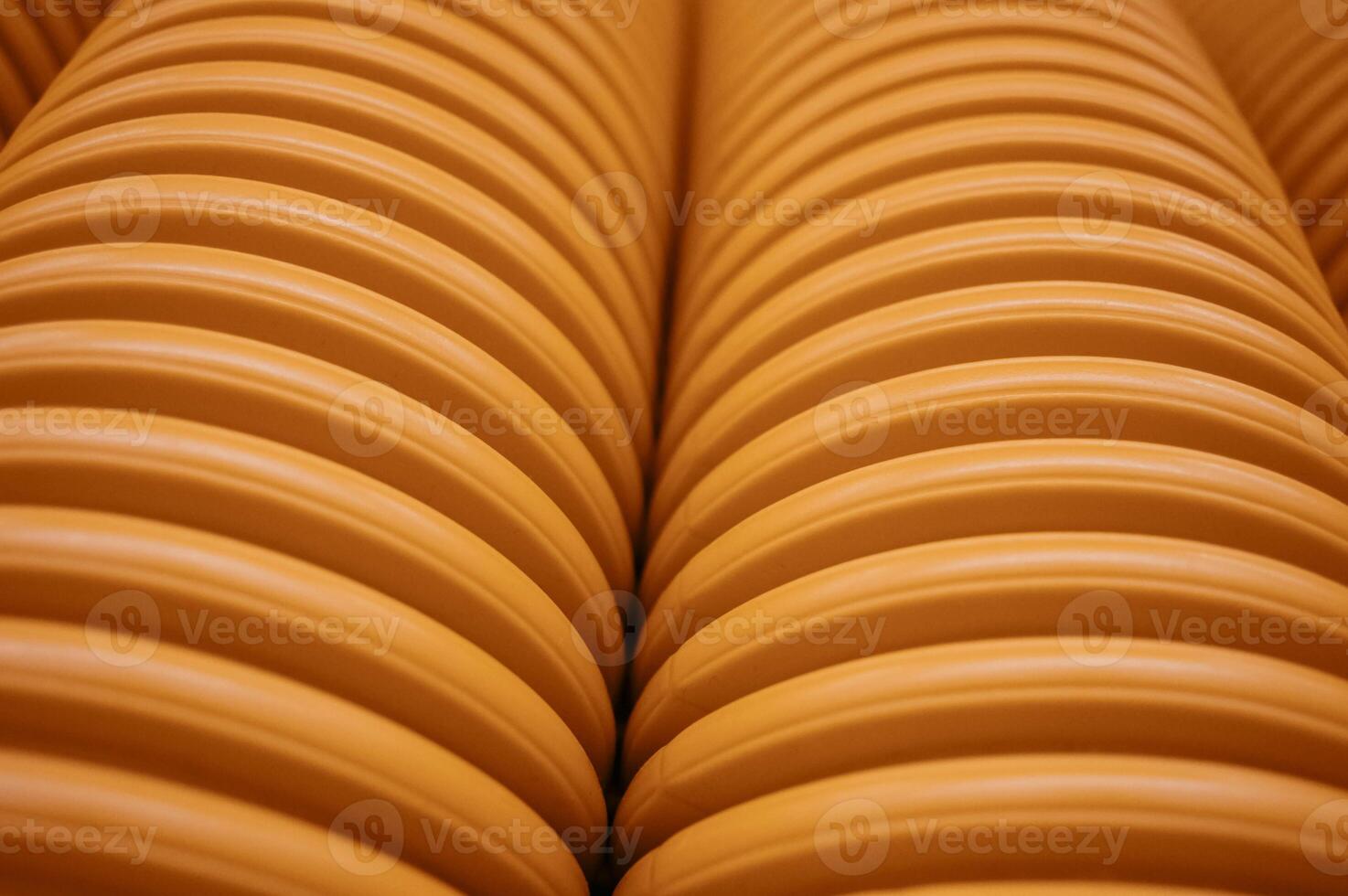 abstract background with striped tube corrugated orange red white. High quality photo