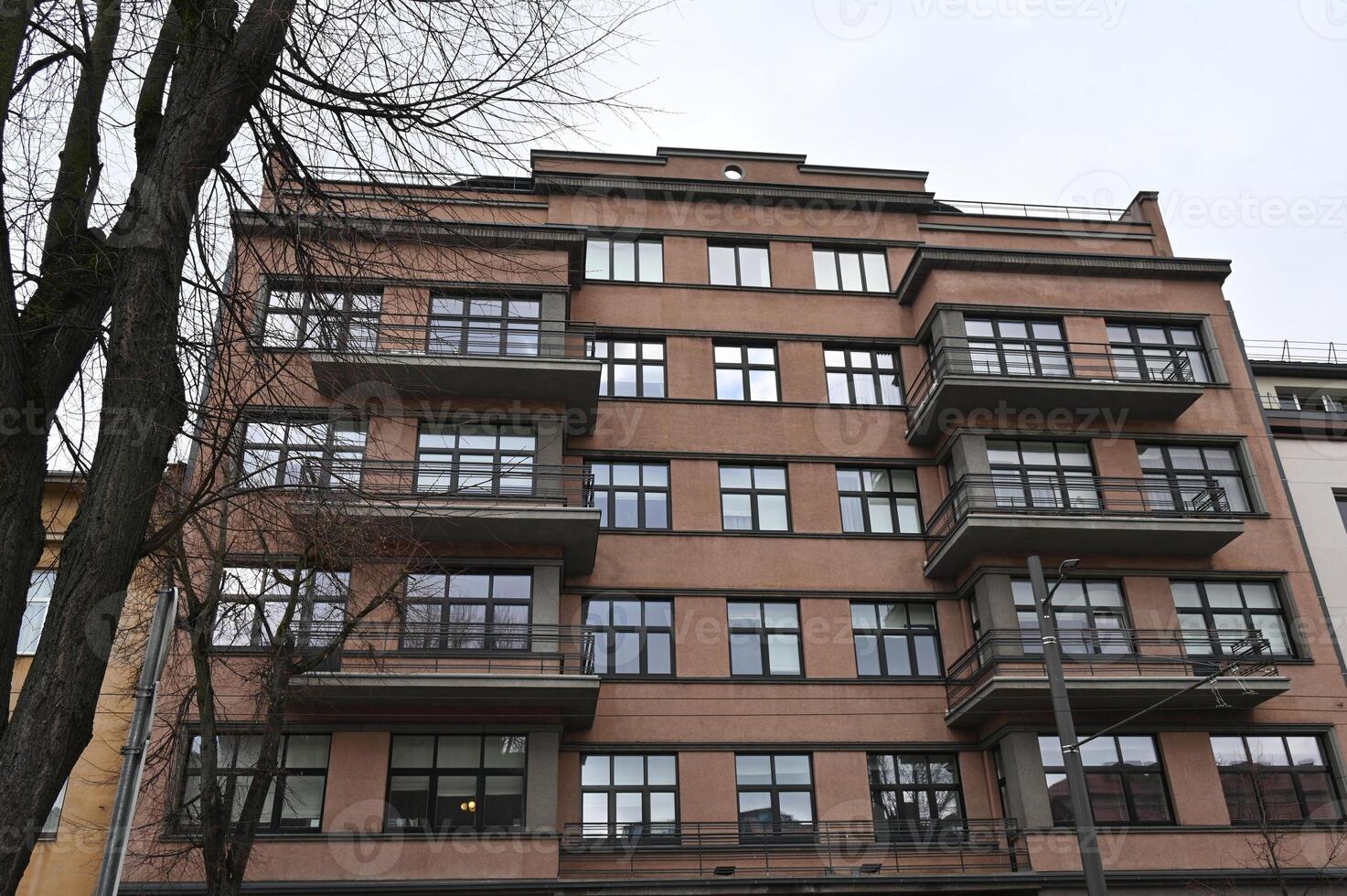 a tall building with many windows photo