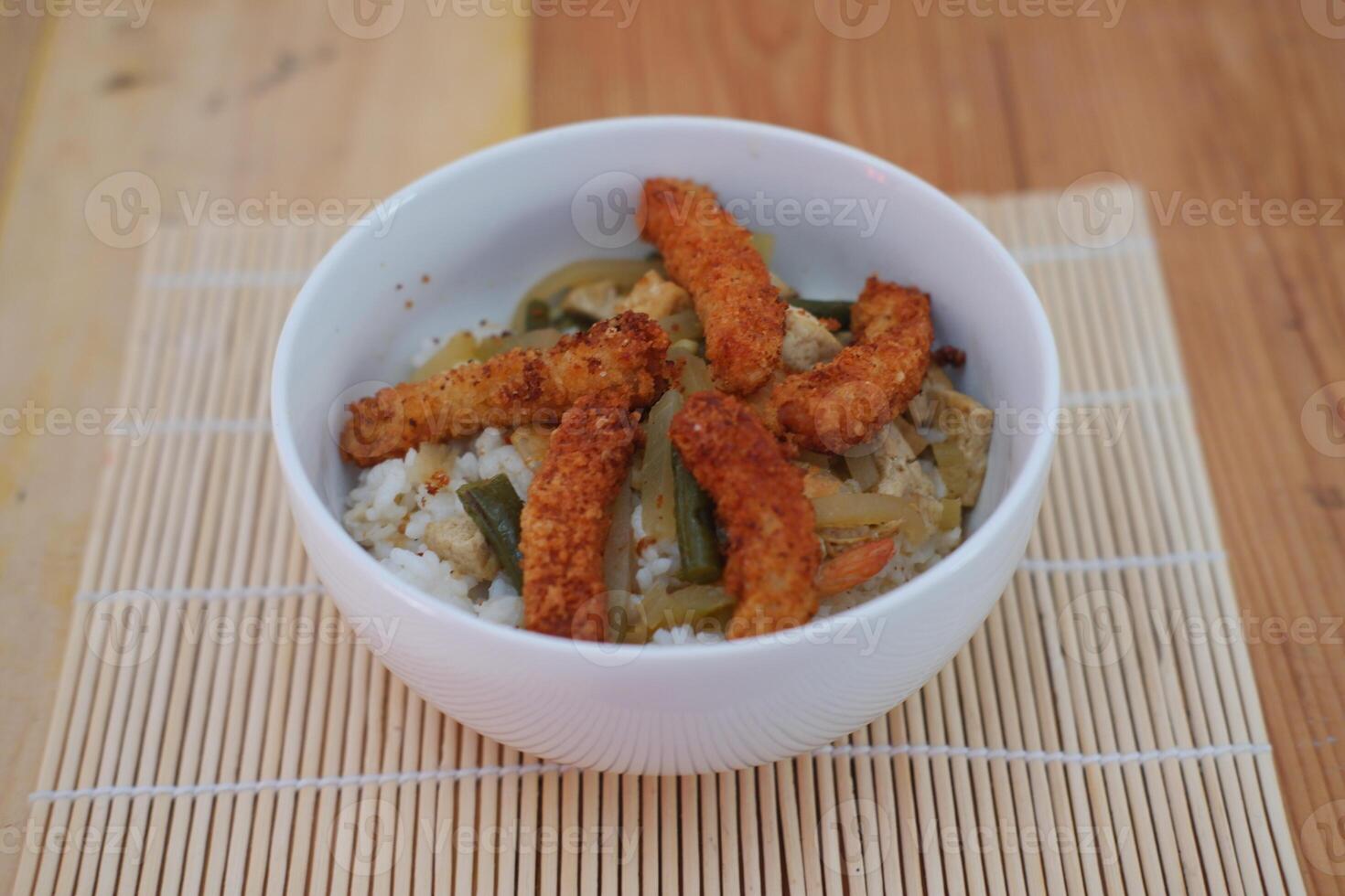 rice and pumpkin vegetables with chicken nuggets photo