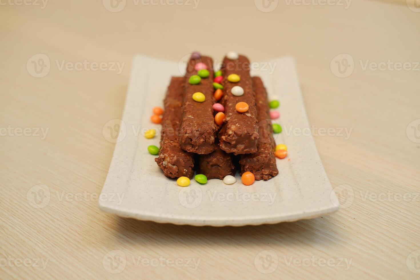 Chocolate wafers on a white plate, close-up photo