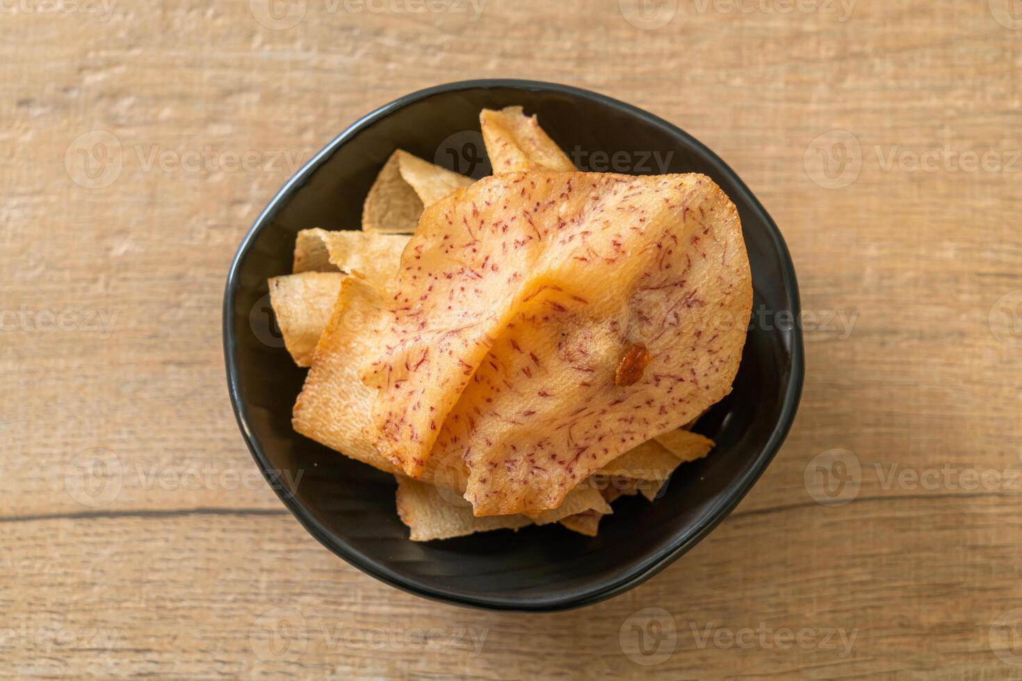 Taro Chips - fried or baked sliced taro photo