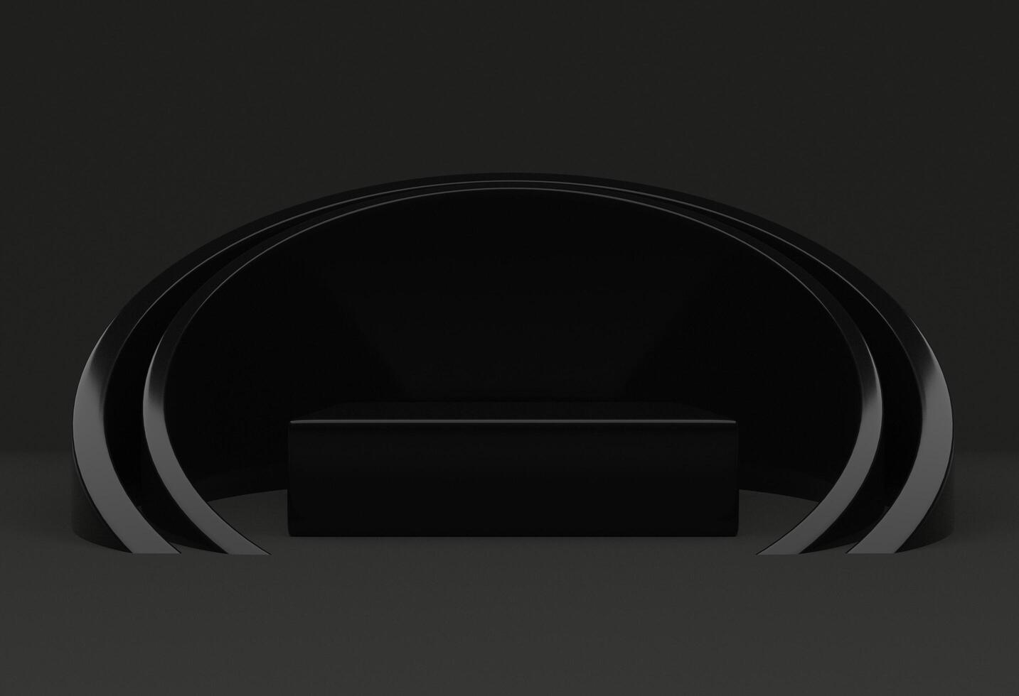 a black and white photo of a curved black chair
