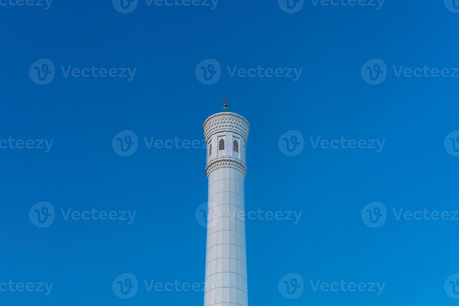 Muslim mosque with white trim and blue dome photo