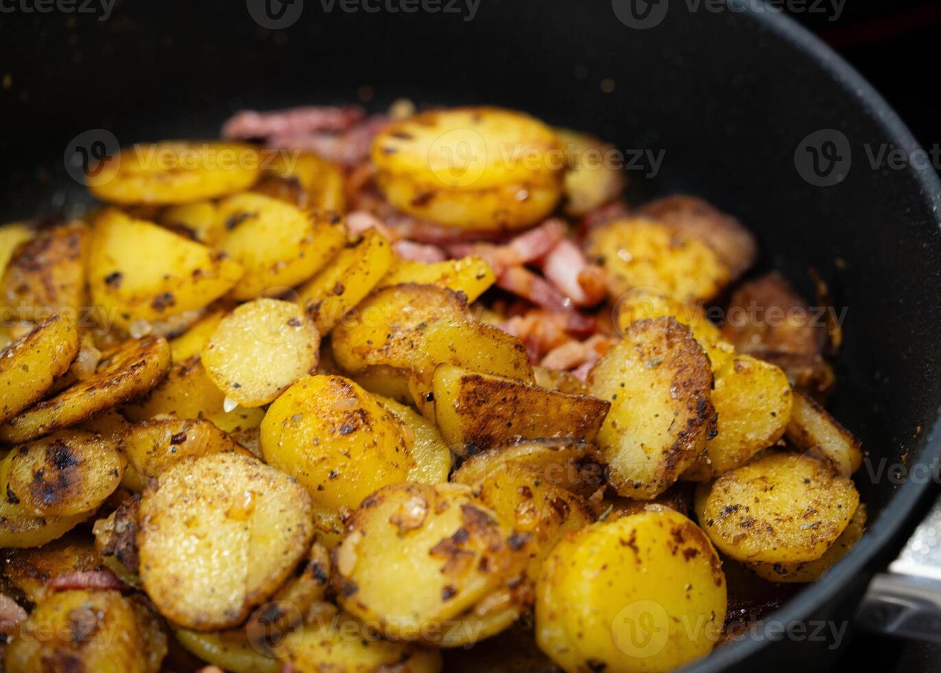 Farmers Breakfast with ham onions and fried potatoes photo